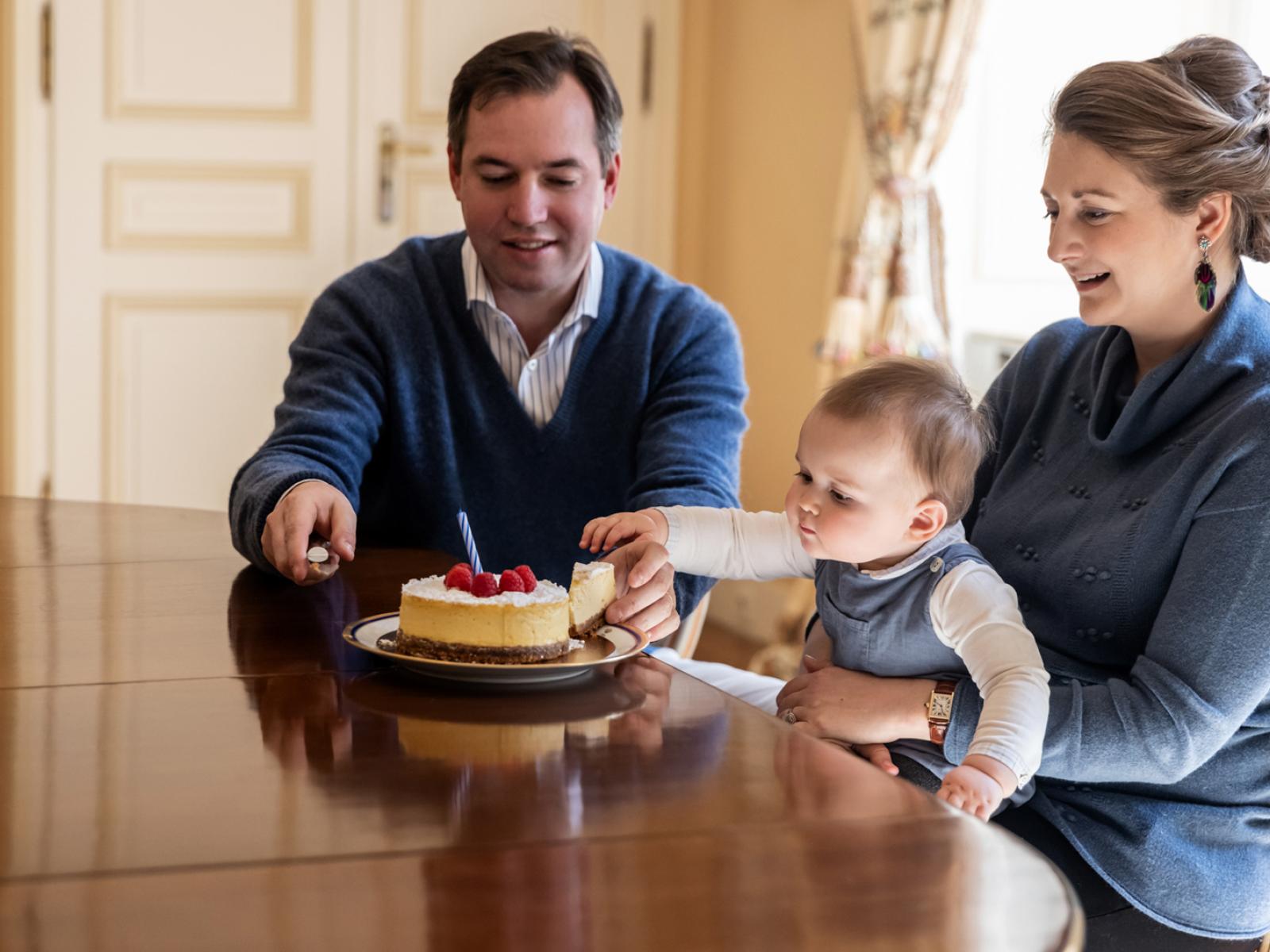 The hereditary couple and Prince Charles eating cake